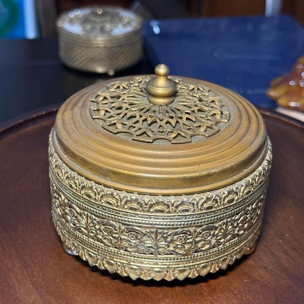 Vintage brass box with intricate floral and geometric embossed